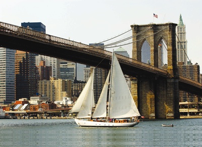 NYC sailing yacht Shearwater and bridge